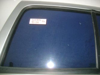 Стекло двери задней левой Renault Symbol 1