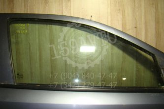 Стекло двери передней правой Opel Astra H