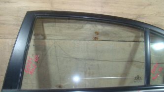 Стекло двери задней левой Kia RIO 2 JB