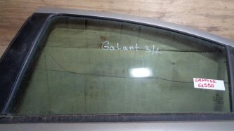 Стекло двери задней левой Mitsubishi Galant 9 DJ, DM