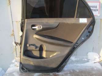 Обшивка двери задней правой Toyota Corolla E150
