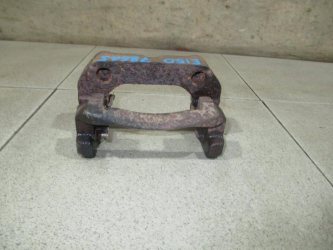 Скоба суппорта заднего Toyota Corolla E150