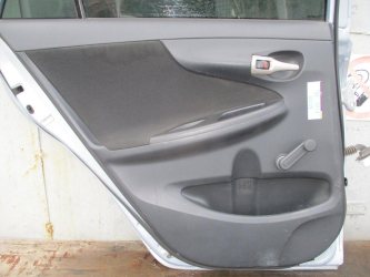 Обшивка двери задней левой Toyota Corolla E150
