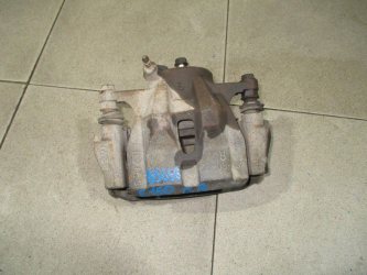 Суппорт передний правый Toyota Corolla E150