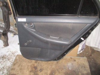 Обшивка двери задней правой Toyota Corolla E120
