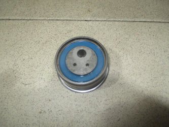 Ролик-натяжитель ремня ГРМ Mitsubishi Galant 9 DJ, DM