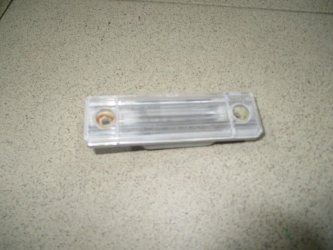 Фонарь подсветки номера Chevrolet Aveo T250, T255