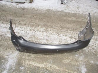 Бампер задний Toyota Corolla E150