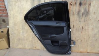 Обшивка двери задней левой Mitsubishi Lancer 10 CY